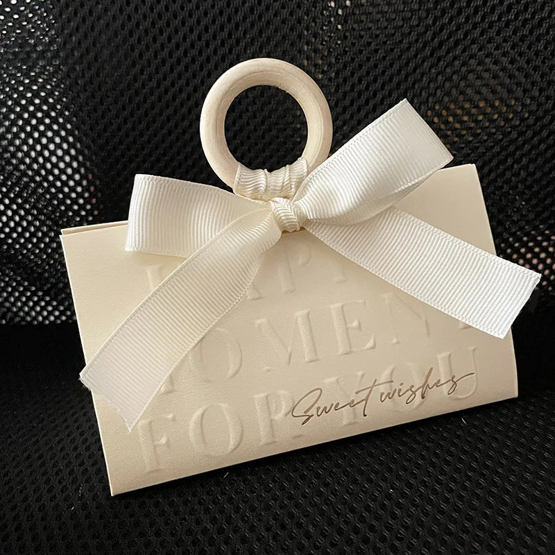 Bolsas para joyas con anillo de madera