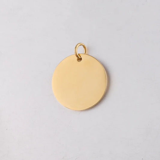 Medalla  grande color dorada 30mm