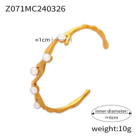 Brazalete  perla Acero inxo dorado