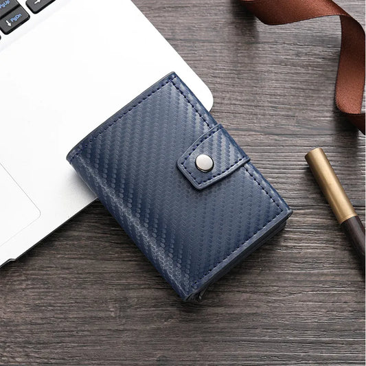 Tarjetero azul de cuerina más metal