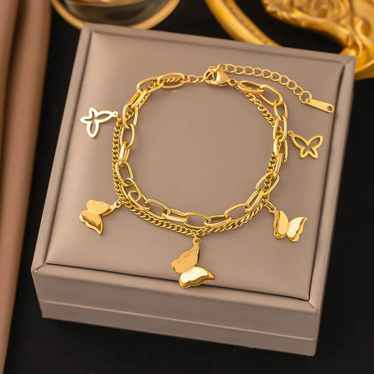 Pulsera dorado doble mariposa