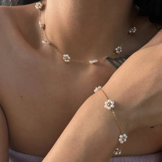 Cadena,  tobillera y cadera de flores con perlas