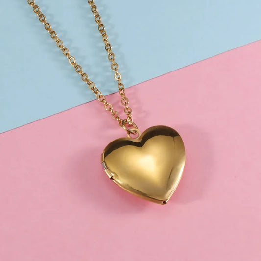 Relicario de corazon liso dorado